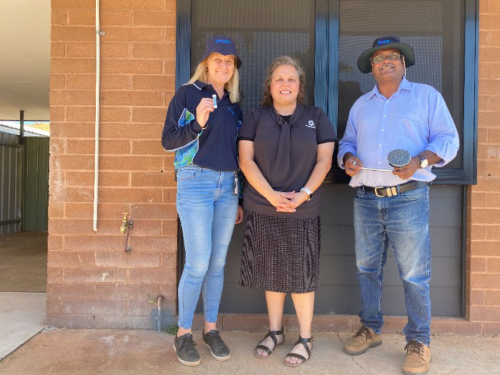 Water Corporation Regional Manager Sharon Broad, DoC Regional Executive Director Neila Williams and Pilbara MLA Kevin Michel at a property that's recently been retrofitted