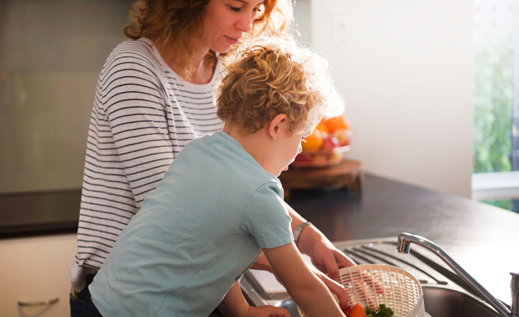 Family washing dishes