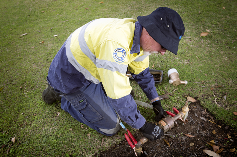 Water Corporation employee attending to a meter