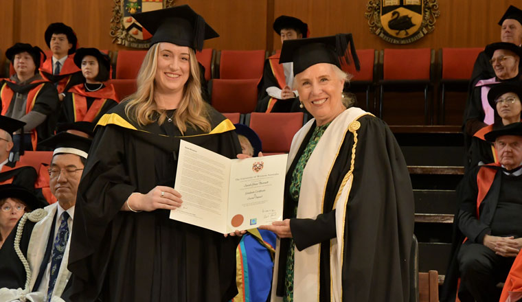 Sarah receiving her certificate from previous Water Corporation CEO Sue Murphy