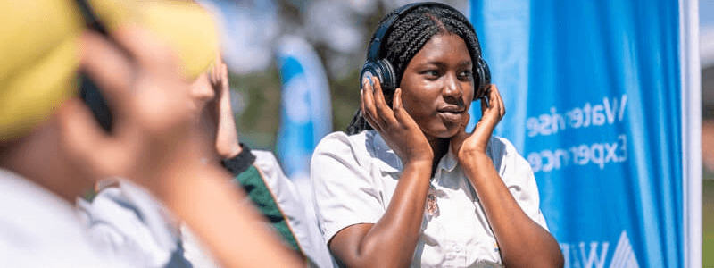 Student with headphones - multisensory incursion