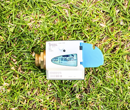 A smart water meter installed in the ground