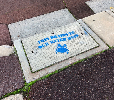 Mandurah drain with message - Ths drain leads to our waterways