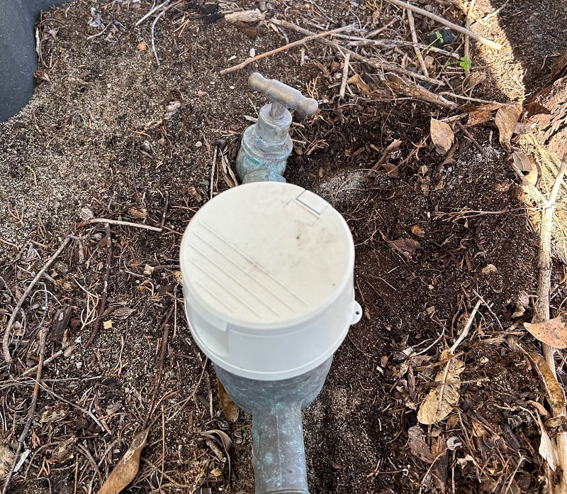 A standard water meter with a t-head tap