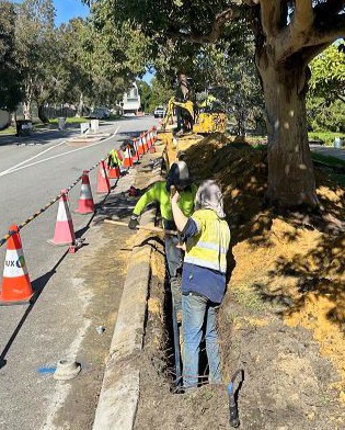 Contractors working on pipe renewals