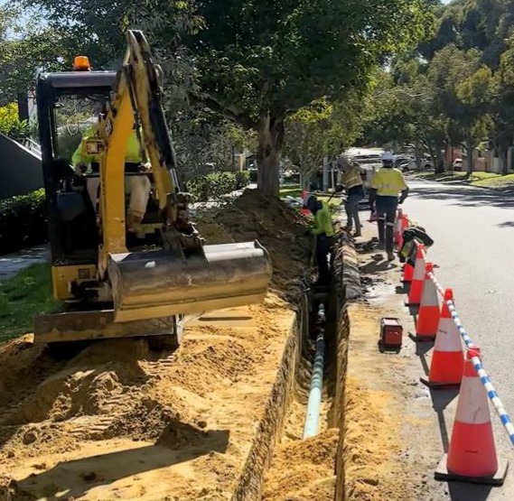 Contractors working on pipe renewals