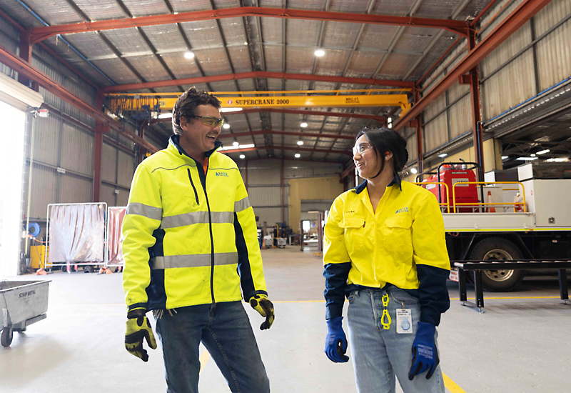 Employees working together in the warehouse