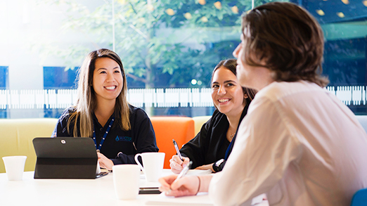 Image of staff at collaborating at Water Corporation