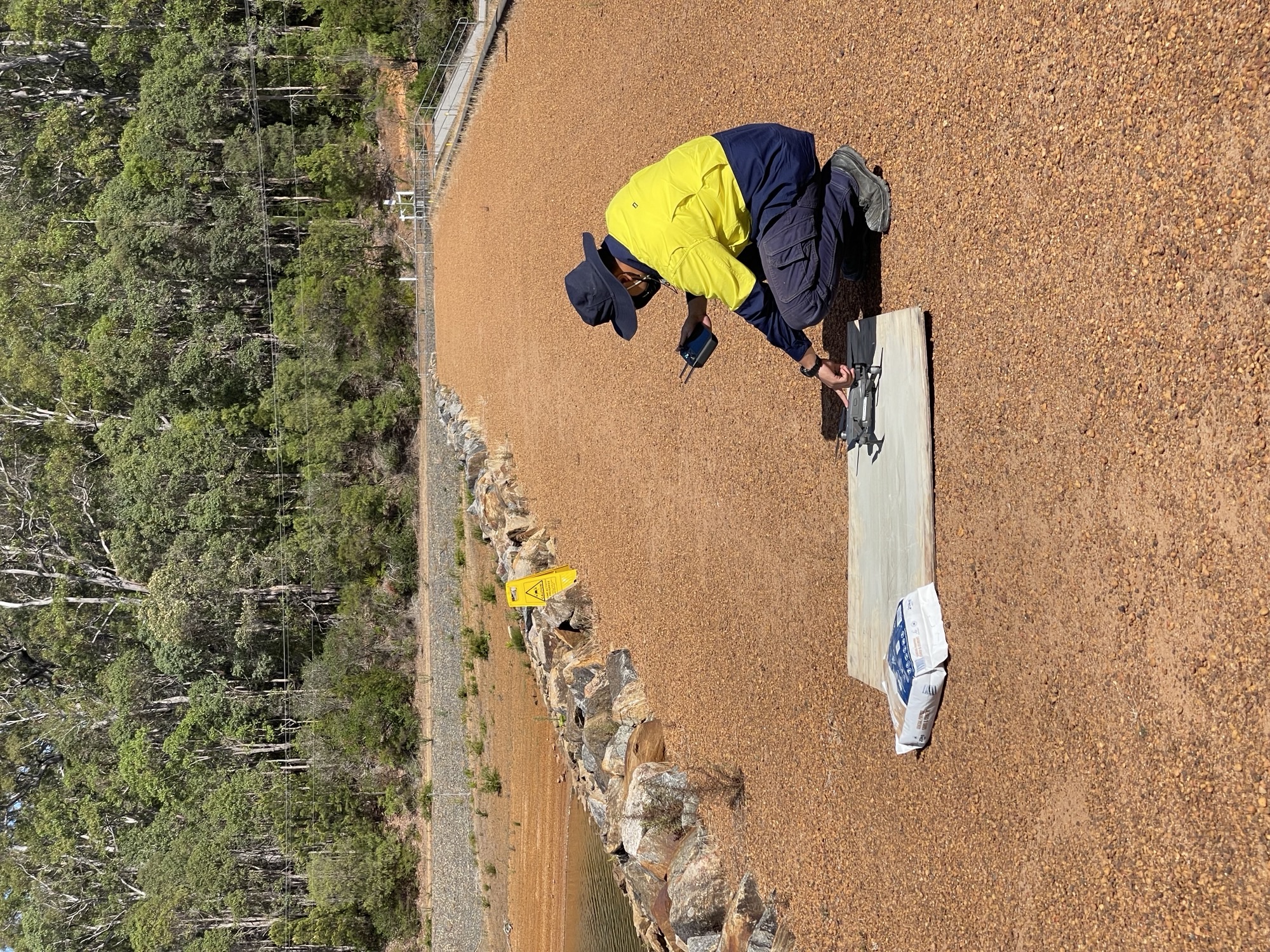 Patrick on a hivis doing his work in nature