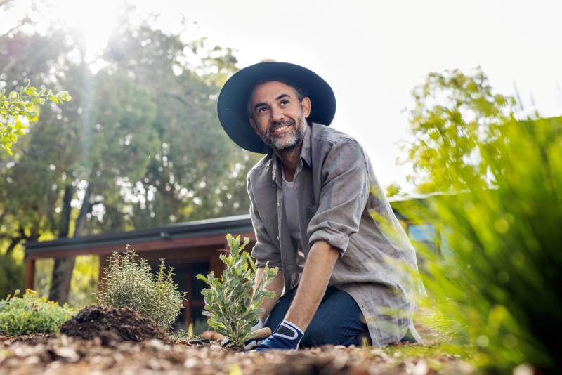 a man planting in the garden