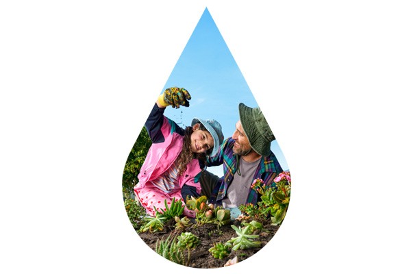 Father and daughter gardening