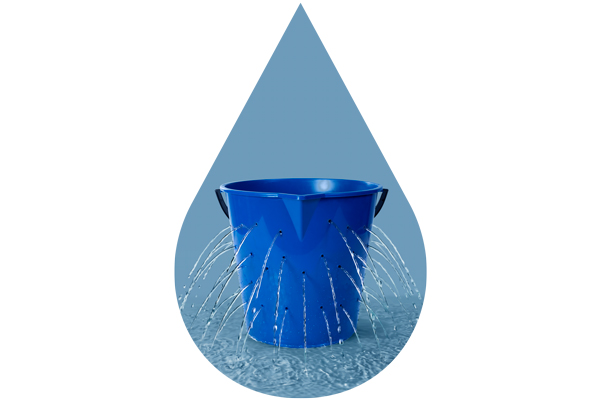 Bucket with holes leaking water
