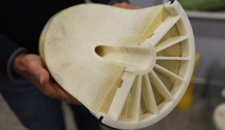 Person holding reverse osmosis membrane