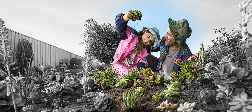 parent and child in garden
